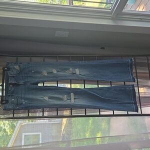 H&M eans with holes and flare leg